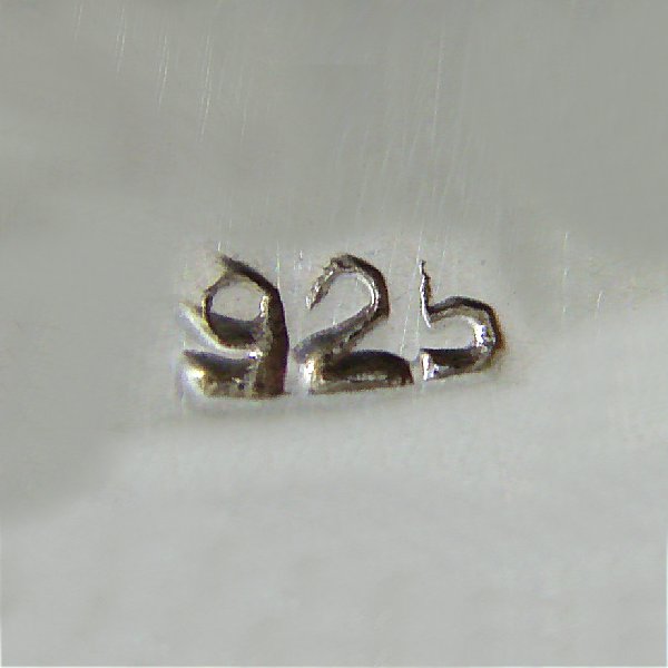 (p1277)Silver pendant motif Sun.